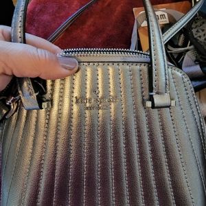 Kate Spade used  small zippered metallic amazing condition crossbody purse